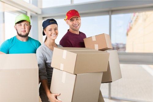 Packed home move materials and furniture in a West London flat