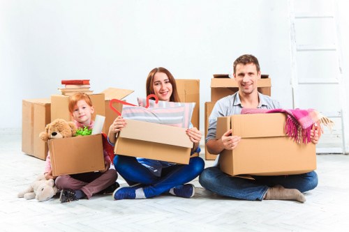 Loading furniture into a removal truck in West London