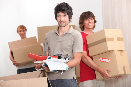Prepared boxes and furniture ready for a removal van service
