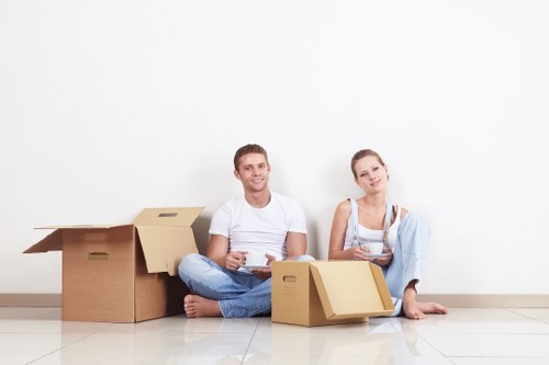 Packed household boxes and furniture prepared for a Shepherds Bush home move