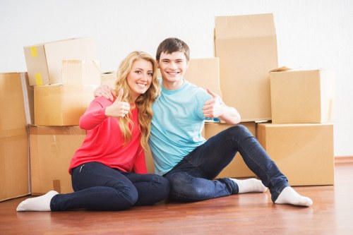 Trained movers using proper lifting techniques