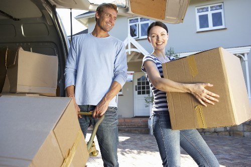 Staff wearing PPE during a moving job